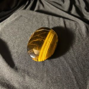 Tigers eye palm stone